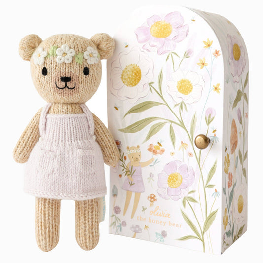 Tiny Olivia the honey bear, gives 10 meals